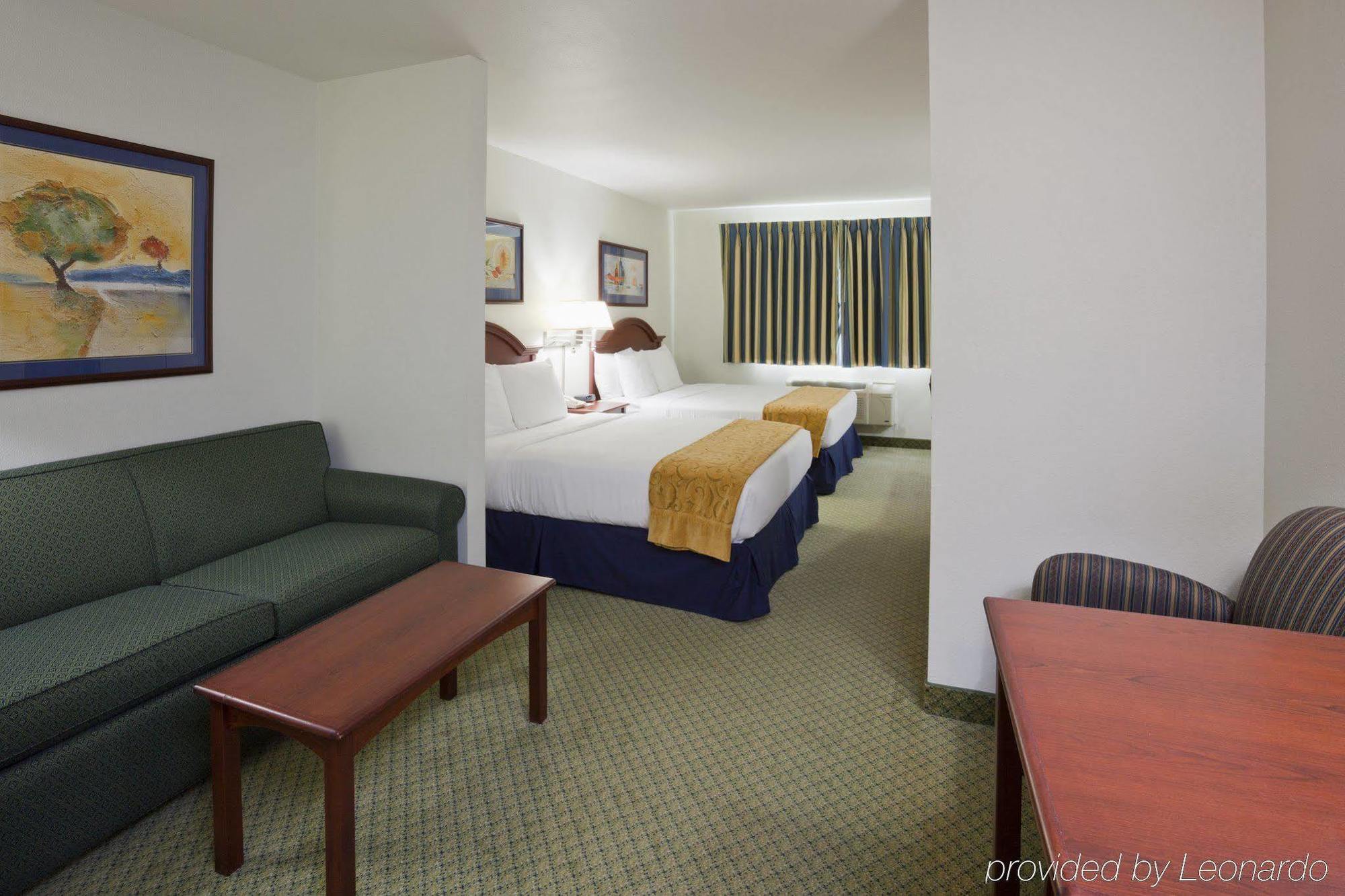 Crossings By Grandstay Inn & Suites Becker Екстериор снимка